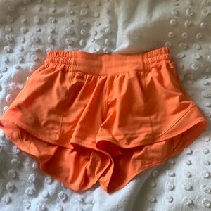Size 4 2.5 inch orange soda lululemon hotty hots